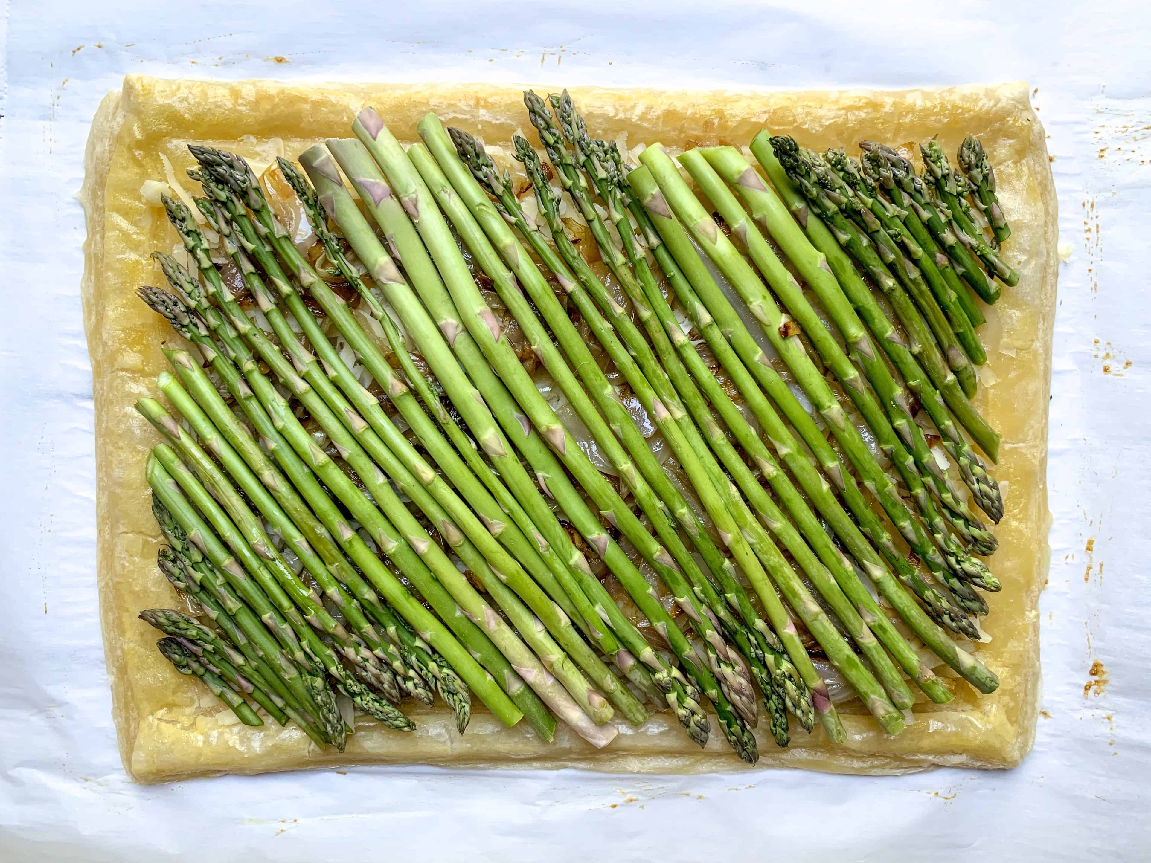 asparagus placed on phyllo dough and ready to be baked. 