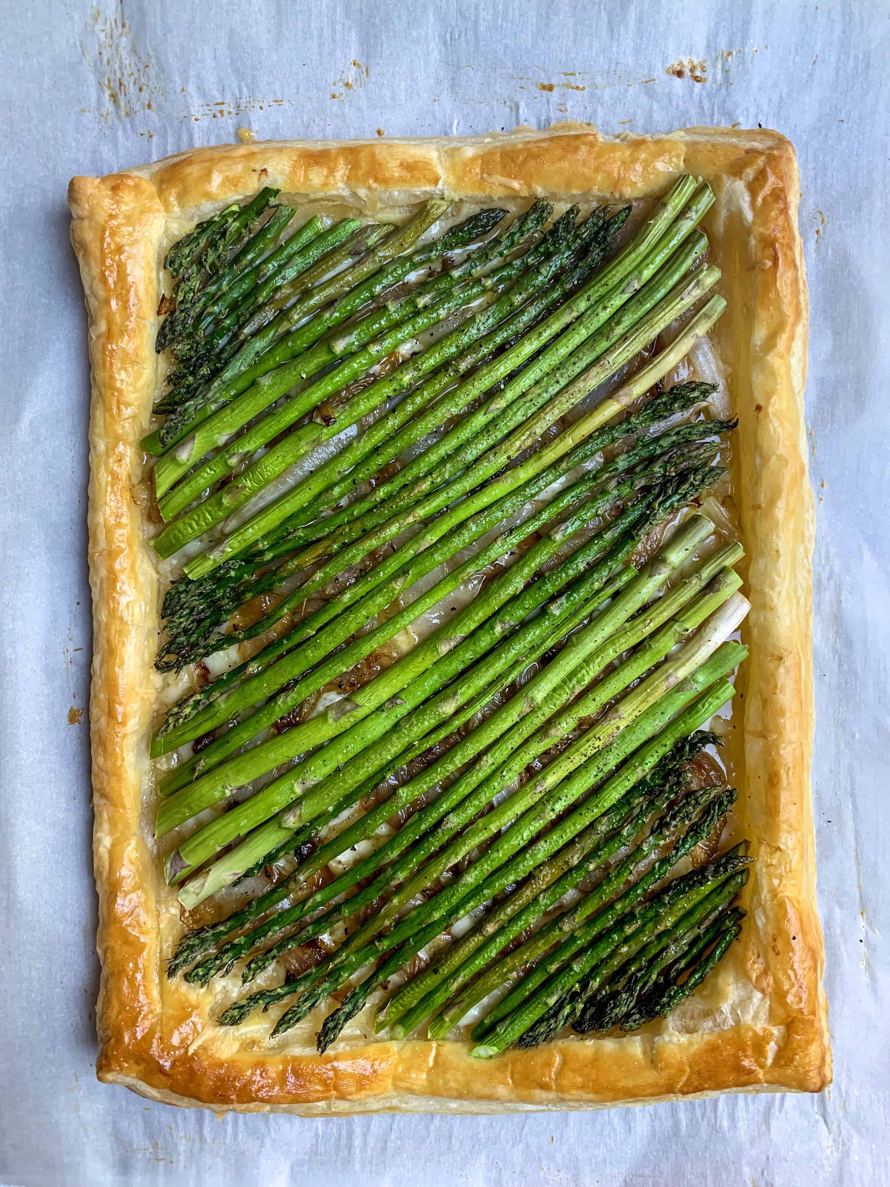 aerial view of asparagus and onion tart.