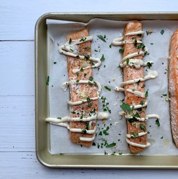 slow roasted salmon with lemon herb tahini dressing