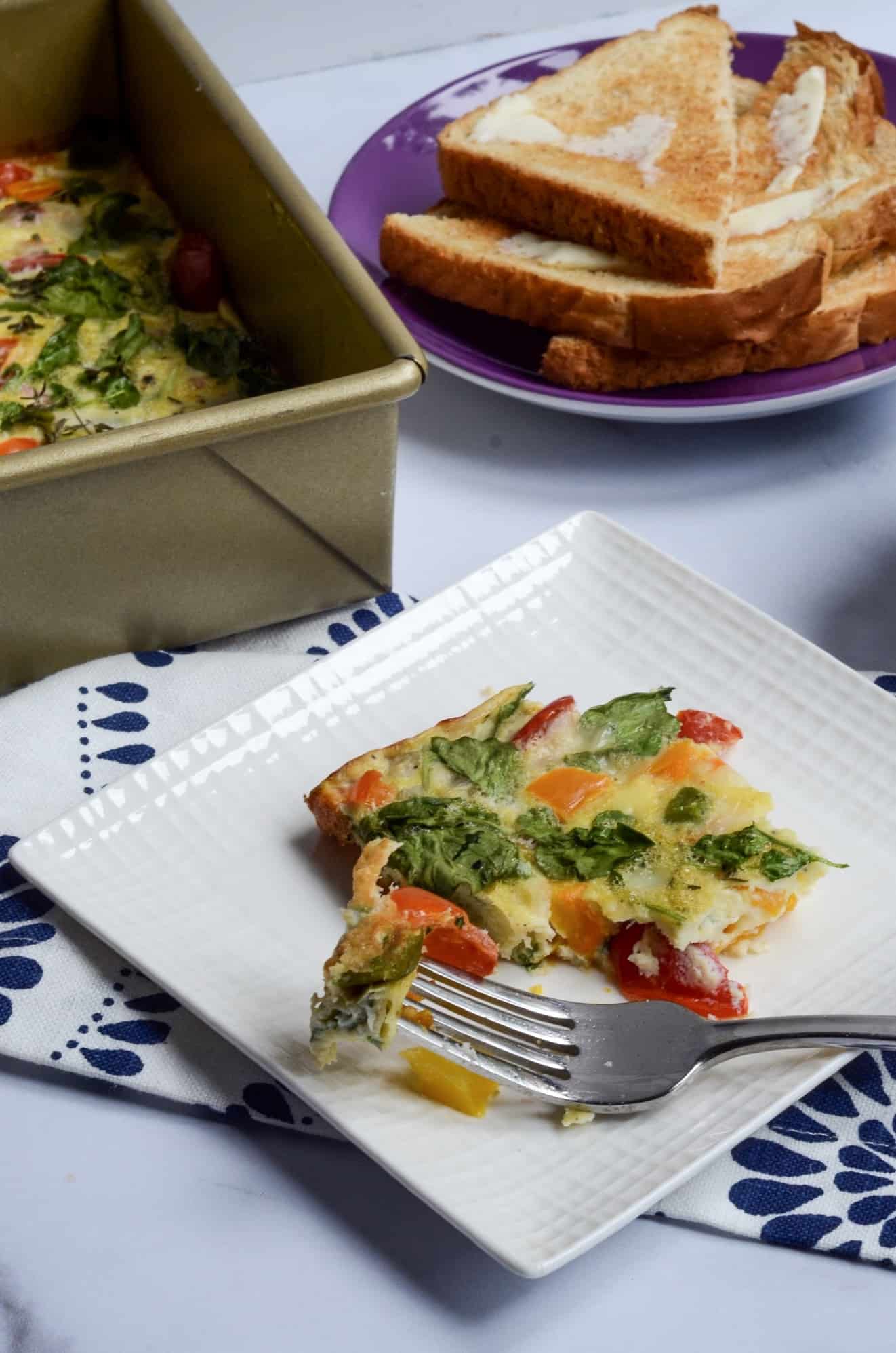 slice of egg and vegetable breakfast bake