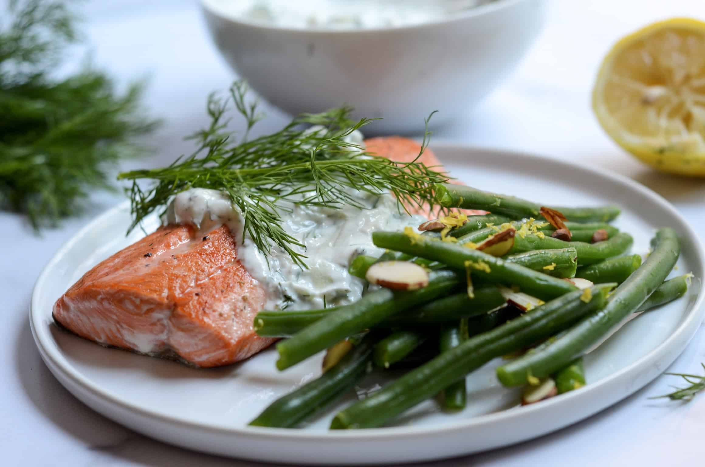 plate of slamon with Tzatziki and green beans