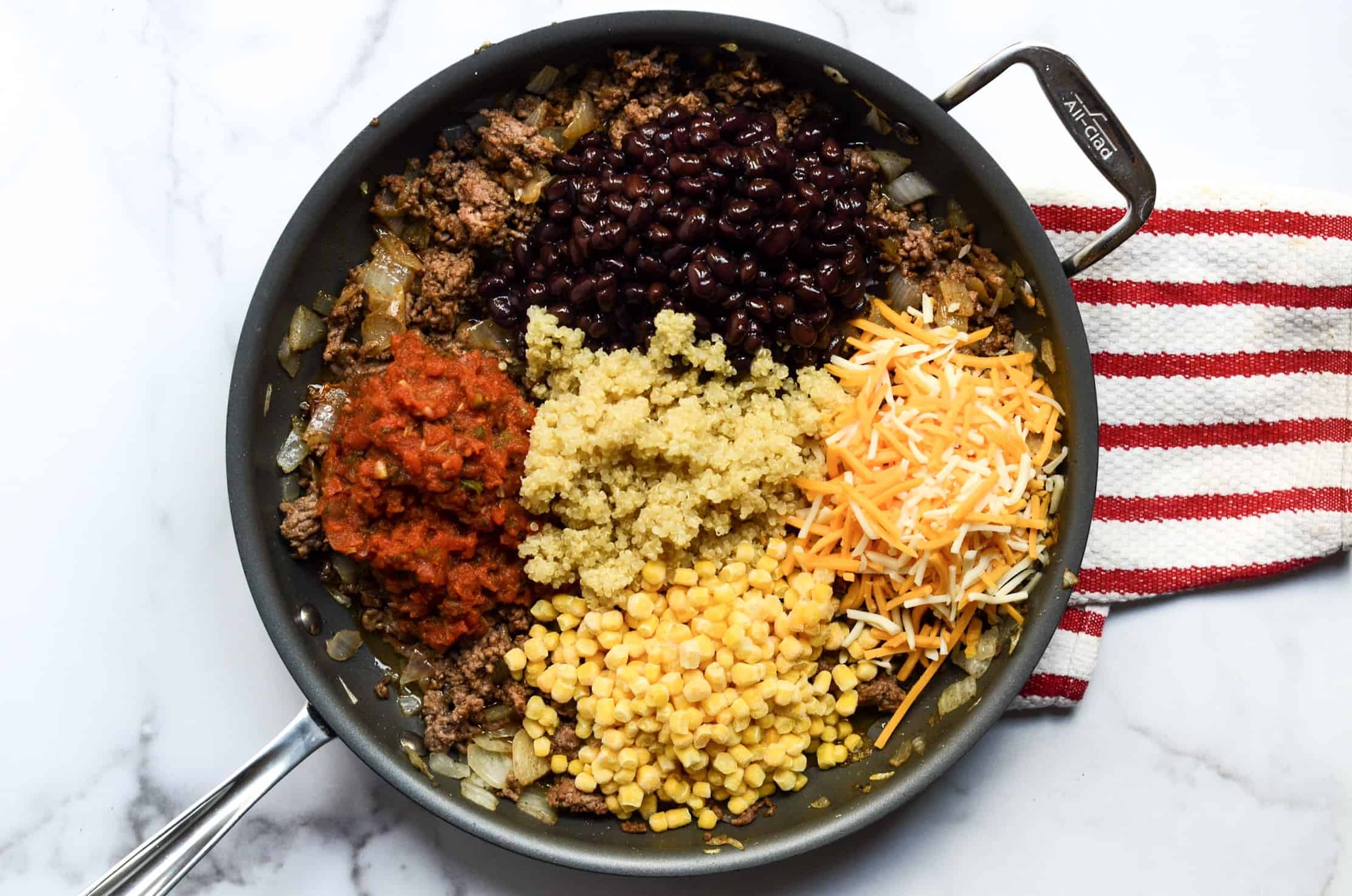 all of the ingredients that go into the stuffed peppers