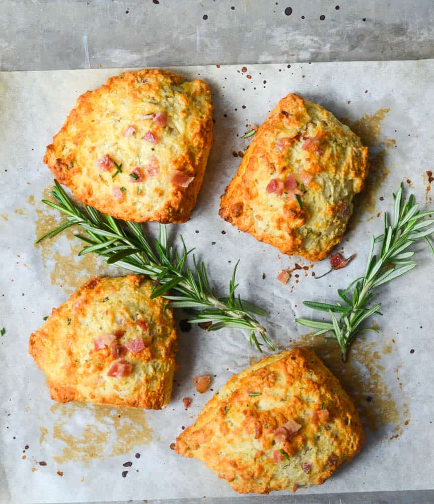 aerial shot of biscuits with two sprigs of rosemary 