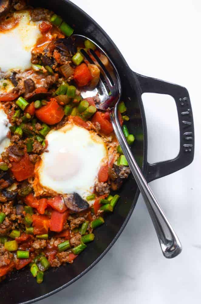 aerial view of shakshuka in cast iron skillet