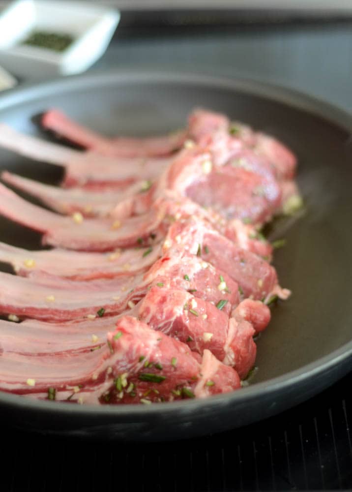 lamb chops frying in pan upright for 3 minutes