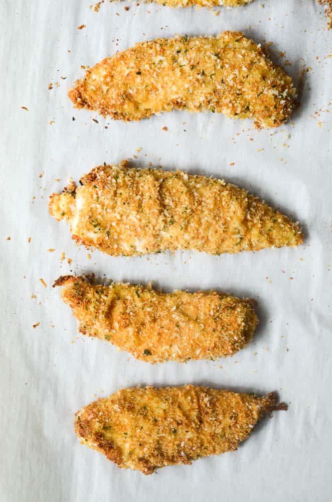 aerial view of cooked chicken tenders after coming out of the oven 