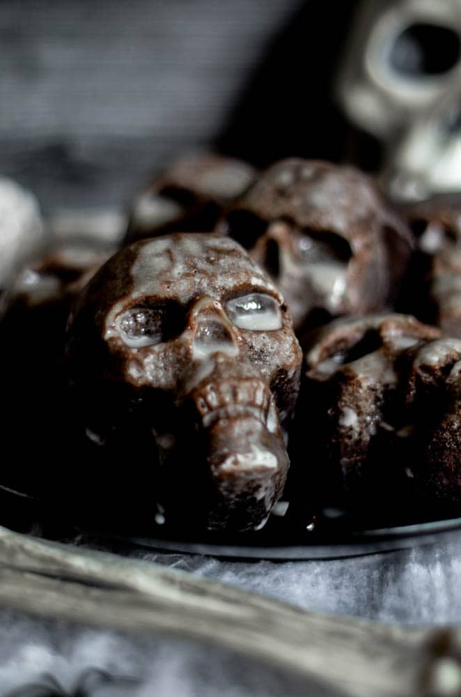 close up picture of one of the skulls with the powdered sugar glaze on top. 