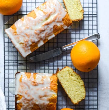 two loaves of orange pound cake taken from above.