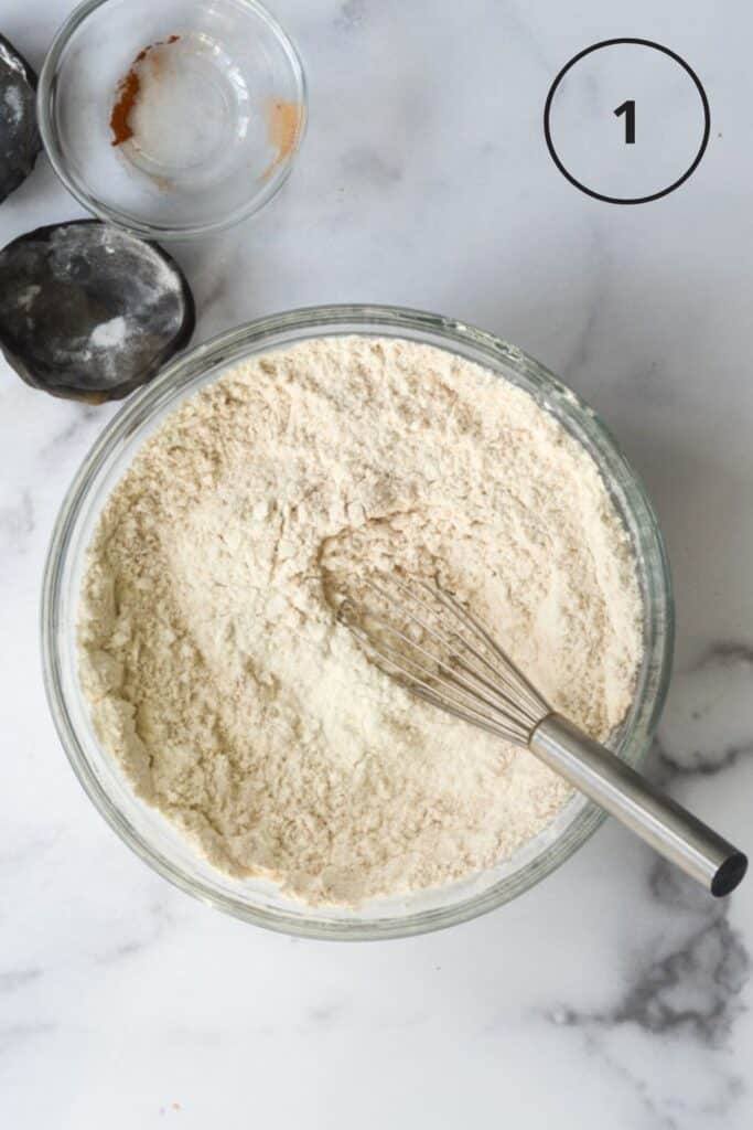 picture showing first step in making the snickerdoodles -- dry ingredients whisked together in a bowl. 