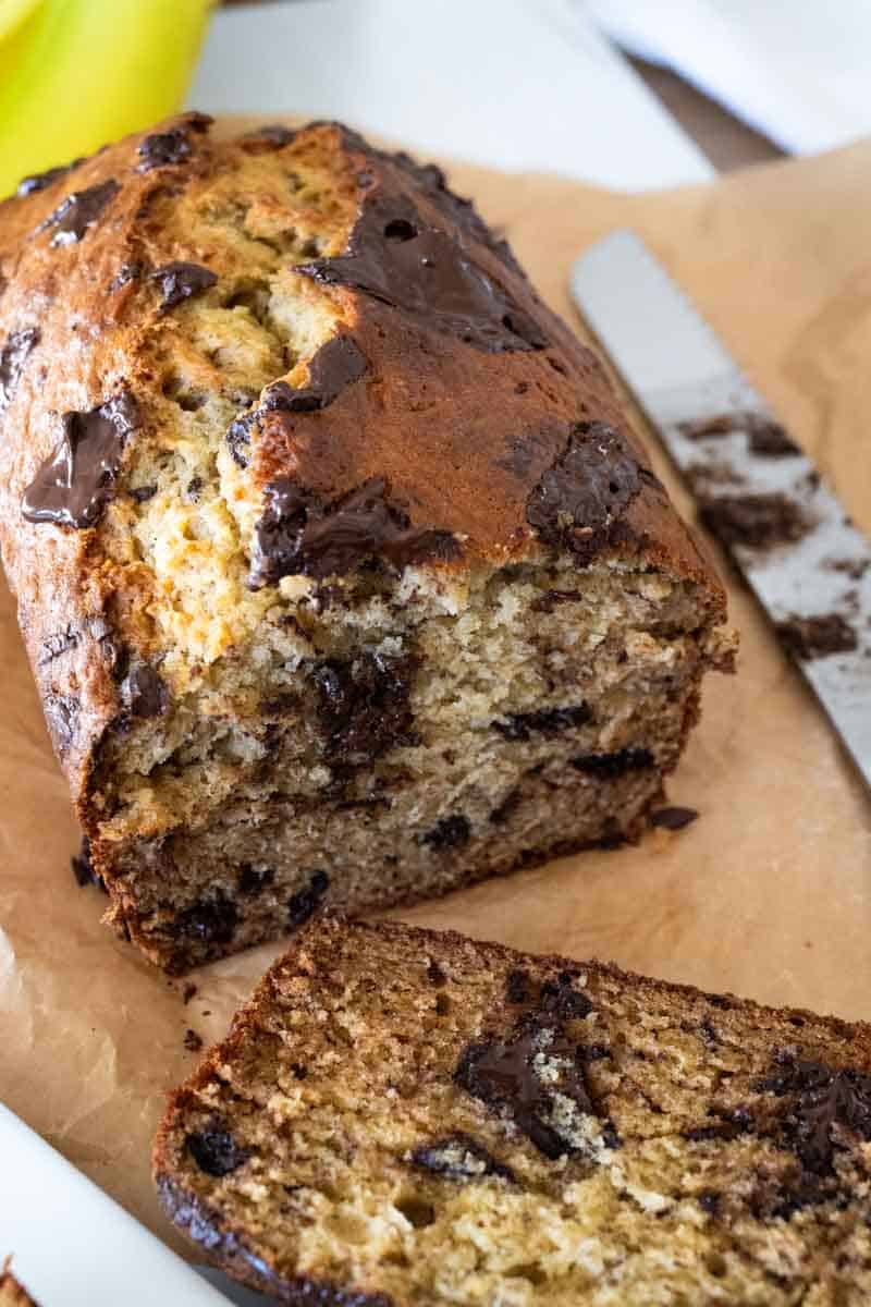 Close up picture of the chocolate banana bread recipe with chocolate chunks. 