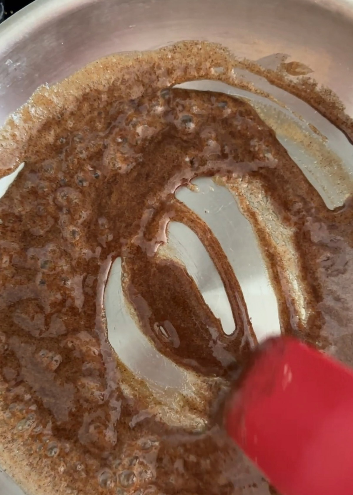 Step 2 being shown in the series with the brown sugar mixture bubbling over medium heat.